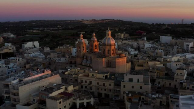 The Parish Church Of The Assumption Of The Blessed Virgin Mary During Sunset In Dingli, Malta. Aerial Shot