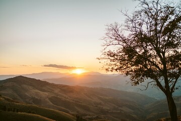 Summer mountains with sunset view of nature cliff mountain.
