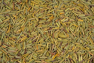 Dried rosemary spice background. Dry seasoning rosemary. Spices and herbs for cooking, provence herbs