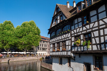 Fototapeta na wymiar Street with half-timbered medieval houses in Strasbourg, Alsace, France
