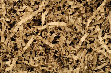 Zig zag shredded paper strips packing filler material background