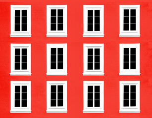 PVC Windows. Architecture background. Vibrant color red wall facade. Small town house exterior. Street of European city building. Twelve window frames isolated on empty wall. Simple windows in a row