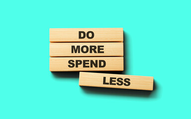 Do more Spend Less on wooden blocks, Financial concept. 3d illustration
