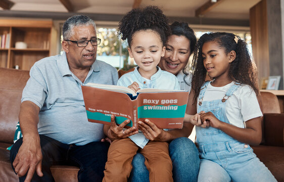 Children Book, Reading And Grandparent Helping Kids With Learning And Education On Sofa. House, Living Room And Black Family On A Lounge Couch With Happiness And Books Together With Love And Support