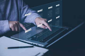 Businessman using a laptop and Taking an assessment, questionnaire, evaluation, online survey online exam Choosing the right answer in exam by filling out the online survey form,Answer  test questions