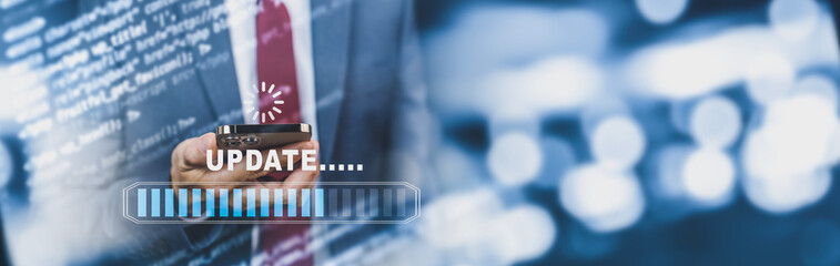 Businessman hold smartphone with Update Software Computer Program Upgrade Business Technology...