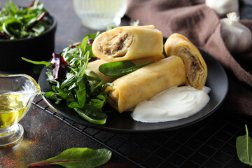 Concept of tasty food, thin pancakes with filling