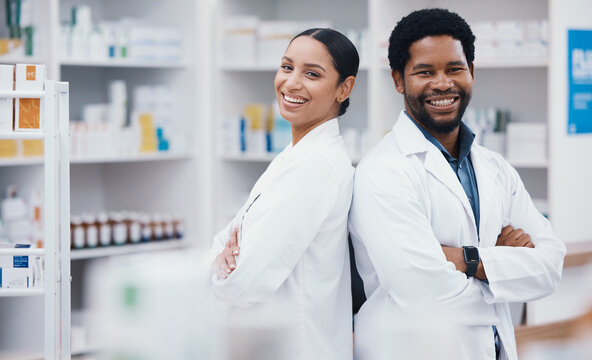 Pharmacists, people and arms crossed in portrait, medicine trust or about us healthcare in medical drugstore collaboration. Smile, happy and confident pharmacy teamwork in retail consulting or help