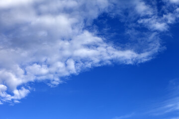 Naklejka na ściany i meble Beautiful blue sky with clouds in summer day