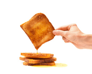 Slices of toasted bread on white background