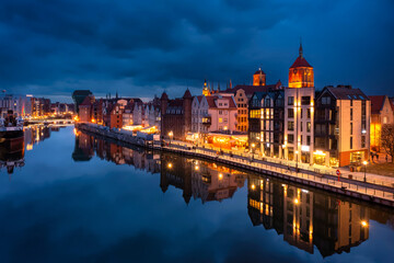 Obraz na płótnie Canvas Old town in Gdansk by the Motlawa river at dusk, Poland.