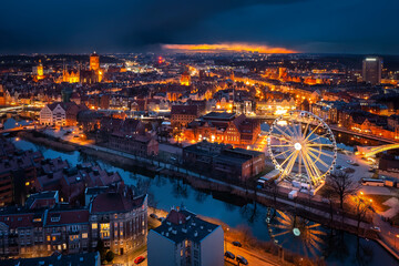 Old town in Gdansk by the Motlawa river at dusk, Poland. - obrazy, fototapety, plakaty