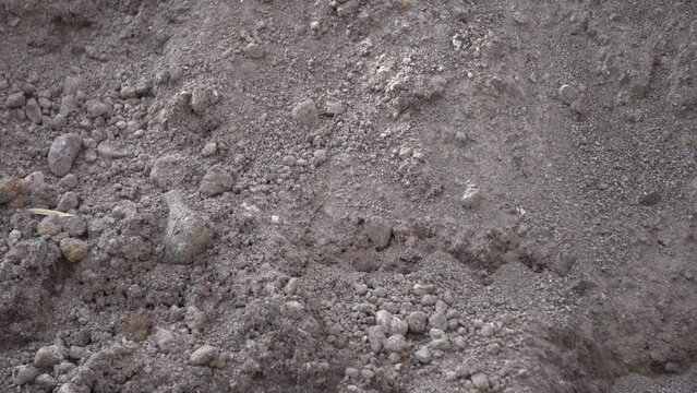 Temanggung, Indonesia - September 2022 : close up of sandstone in gray color, perfect for video background, documentation, education, ect.