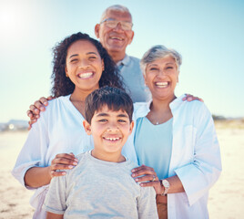 Beach, family and portrait of grandparents with kids, smile and happy bonding together on ocean vacation. Sun, fun and happiness for senior man and hispanic woman with children on holiday in Mexico.
