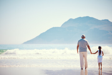 Holding hands, relax and grandfather with child at beach for holiday, bonding and vacation mockup. Affectionate, travel and happiness with old man and girl walking for summer break, fun and support