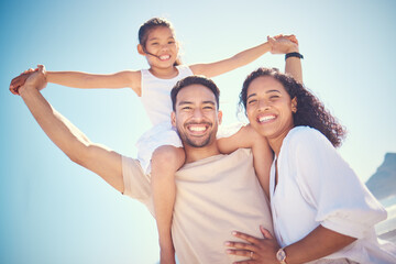 Portrait, beach and happy family smile, piggyback and bond outdoor against blue sky background....
