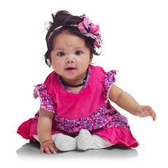 A little girl with an innocent and charming demeanor, displaying a delightful smile while contentedly engaged in playtime isolated on a PNG background