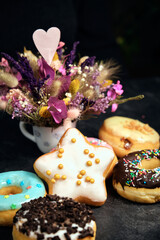 assorted donuts cake on a dark background