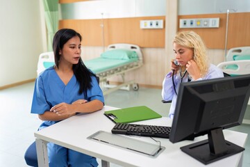 A doctor discus with patient on healthy problem and use stethoscope measure breathing at hospital