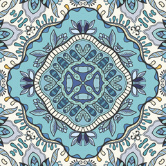 Hand drawn seamless graphic pattern, colorful artistic background with floral and geometric elements. Doodle ethnic mandala ornament for textile fabric, paper print. Surface texture 