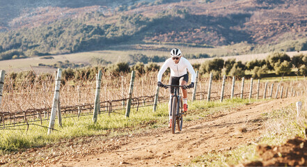 Man, bicycle and cycling on gravel in nature, countryside and training for triathlon, sports and...