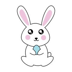 Rabbit holding an egg in its paws