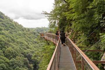 person walking on a bridge