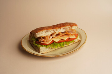 Sandwich with ham, lettuce and tomato