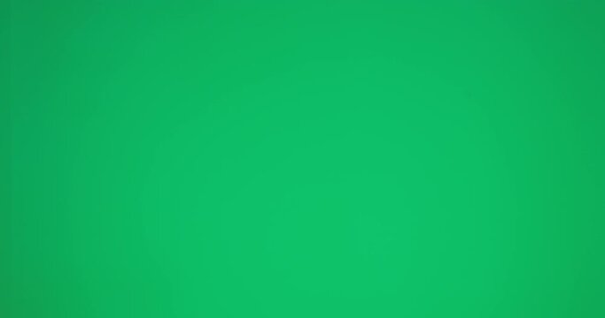 Hand, thumbs up and approval on a green screen background in studio to gesture yes in agreement. Emoji, thank you and motivation with a woman gesturing for positive review on black mock up space