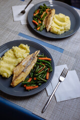 Potatoes with fish sauce and vegetables