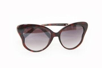 Women's sunglasses in a plastic decorative frame