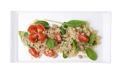 Delicious quinoa salad with tomatoes, beans and spinach leaves isolated on white, top view