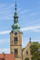 The tower of the Church of St. Anastasia, seen from the bank of the Gradna River