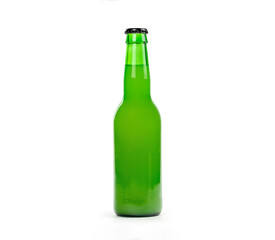 Green glass bottle with  lime lemonade, cider, soda or beer on white background