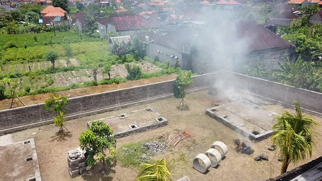 Wood Burning Creating Toxic Smoke in Rice Fields of Bali Indonesia Asia Southeast Tradition and Pollution Problem, Aerial View