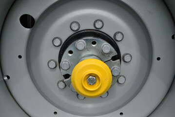 Close Up of Wheel Hub and Bolts on Modern  Agricultural Tractor 