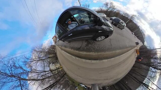 Couple travelling by car on tiny planet