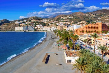 Almunecar, Spain, Costa del sol - 24.1.2023: Beautiful city and coast view - obrazy, fototapety, plakaty