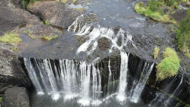 Spectacular aerial footage of Millstream Falls Atherton Tablelands Queensland Australia