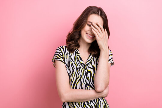 Photo of young funny laughing dreamy positive comic toothy smile touch forehead wear zebra stylish shirt good joke isolated on pink color background