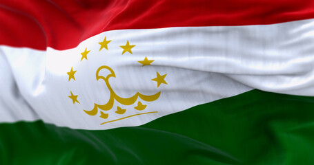 Detail of the Tajikistan national flag waving in the wind