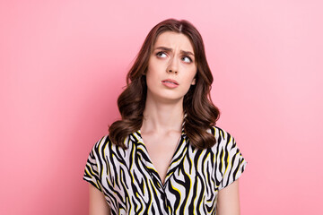 Portrait photo of young minded thoughtful brown wavy hair lady look empty space dislike information sceptic isolated on pink color background - obrazy, fototapety, plakaty