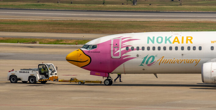 Nok Air jetliner being pushed back for take-off at Don Mueang International Airport in Bangkok