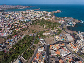 Aerial photos of Praia, the capital city of Santiago Island, Cabo Verde, reveal a bustling metropolis with a vibrant culture, stunning architecture, and breathtaking views of the Atlantic Ocean.