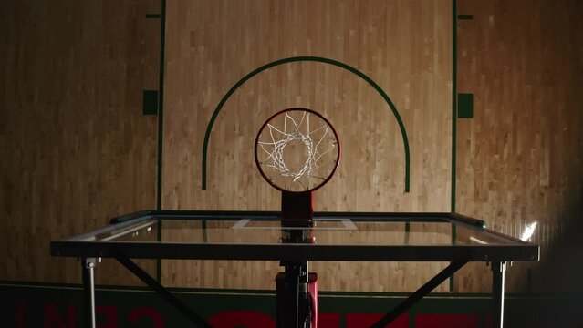 Male Athlete Sinking Hoops and Executing a Slam Dunk Indoors, Top Down