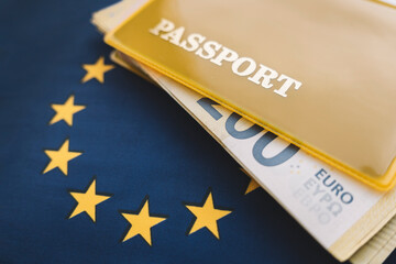 Fototapeta premium passport and money of the European Union on EU flag