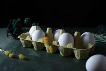 Easter decor in the form of eggs decorated with flowers