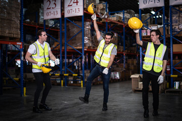 Caucasian male warehouse workers showing teamwork and partnership. teamwork at warehouse storage department.