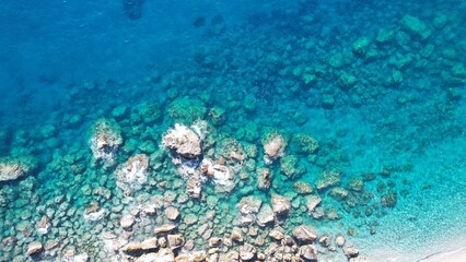 Submerged cliffs A bird's eye view of a deserted beach The white sandy coastline 