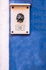 Lionhead Intercom Doorbell On A House In Burano, Venice